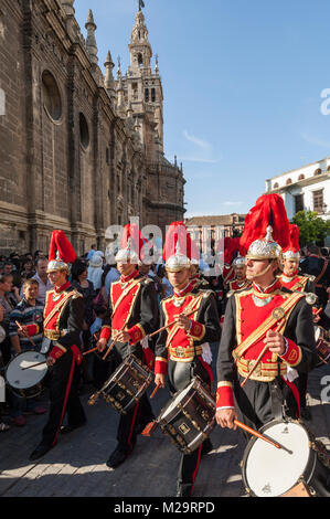 Music band performing a processional march during a procession of Holy Week. Stock Photo