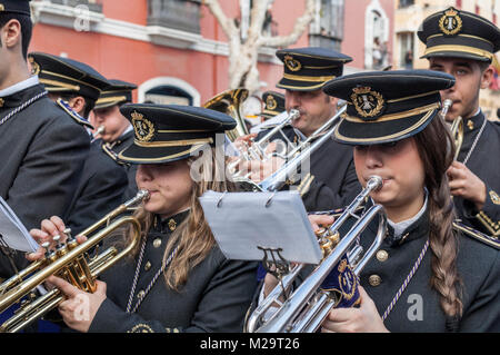 Music band performing a processional march during a procession of Holy Week. Stock Photo