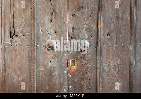 Part of old wooden door with keyhole Stock Photo