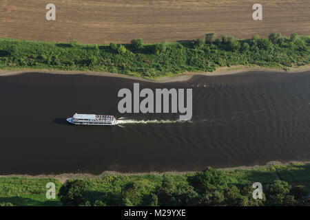 Tourist boat on the Elbe River pictured from the observing point next to the Bastei Bridge (Basteibrücke) in Saxon Switzerland (Sächsische Schweiz) in Saxony, Germany. Stock Photo