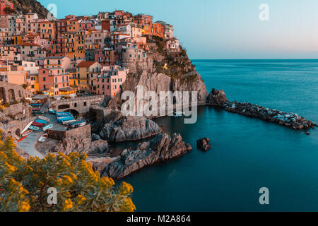Manarola, Cinque Terre, Liguria, Italy. Sunset over the town, view from a vantage point Stock Photo