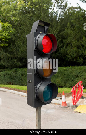 Temporary traffic control lights showing Stock Photo
