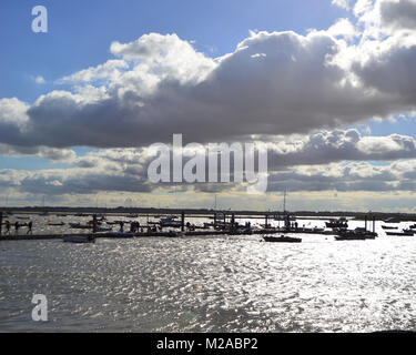 Gathering clouds over a silver sea.,Mersea Island, Essex, England, countryside, coastal, Rural, Beautiful England, seascape, Stock Photo