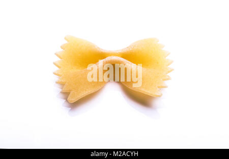 Dried, uncooked farfalle pasta bows. Stock Photo