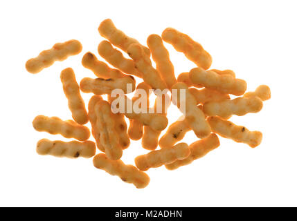 Top view of a group of cheddar cheese flavored mini breadsticks isolated on a white background. Stock Photo