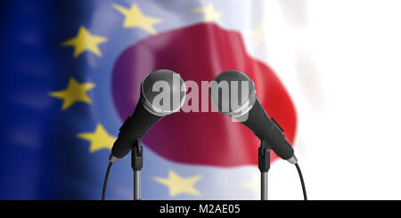 Relationship between European Union and Japan. Two cable microphones in front of blurred flags for backdrop. 3d illustration Stock Photo