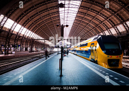 Amsterdam train station railway platform, Netherlands Dutch Stock Photo