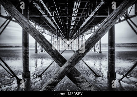 Black and white image shot under the pier in Weston Super Mare, Somerset UK Stock Photo