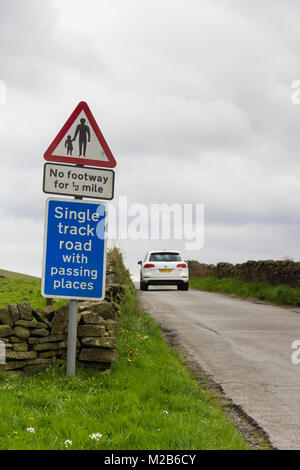 Single track road with passing places sign. Elnor Lane, on the hills south of Whaley Bridge and heading south towards the Goyt valley. Stock Photo