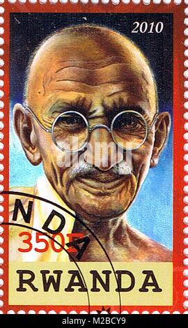 RWANDA - CIRCA 2010: A stamp printed in Rwanda shows Mahatma Gandhi, series, circa 2010 Stock Photo