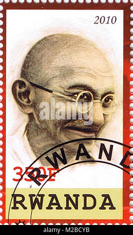 RWANDA - CIRCA 2010: A stamp printed in Rwanda shows Mahatma Gandhi, series, circa 2010 Stock Photo