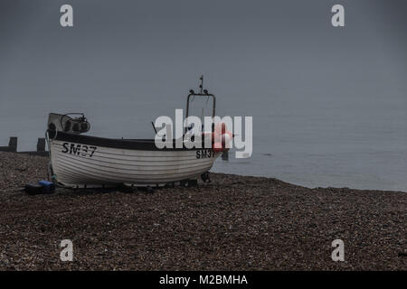 Boats on the Beach in Sussex, in the middle of winter Stock Photo