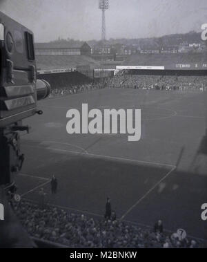 1960s, historical, overhead picture showing the football pitch and stands of Norwich FC at this time, taken from the television gantry overlooking the stadium and surrounding area, Norwich, England, UK. Stock Photo