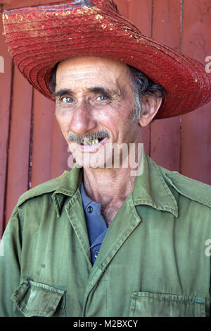 Portrait of smiling farmer wearing straw hat Stock Photo - Alamy