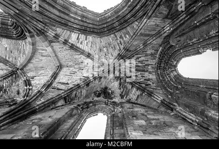Looking up at cross section of archways of Whitby Abbey, Whitby, Yorkshire, UK Stock Photo