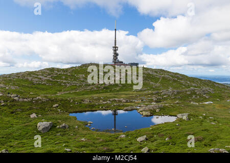 Mount Ulriken in Norway. Aerial view on the mountain lake and town by the fjords. Stock Photo