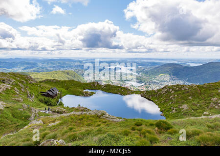 Mount Ulriken in Norway. Aerial view on the mountain lake and town by the fjords. Stock Photo