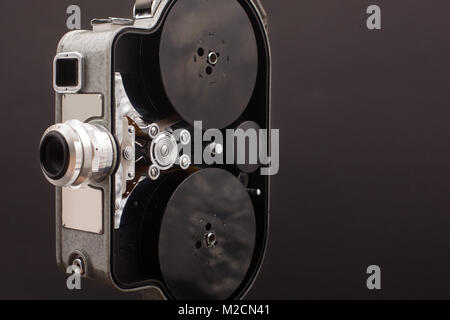 Cine camera on black - vintage cam > old camera on a dark background. Stock Photo