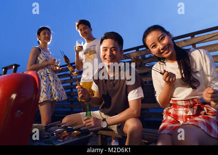 The young people have a picnic Stock Photo
