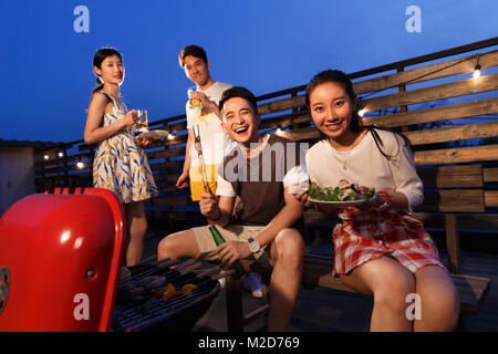 The young people have a picnic Stock Photo