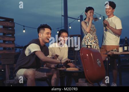 The young people have a picnic Stock Photo