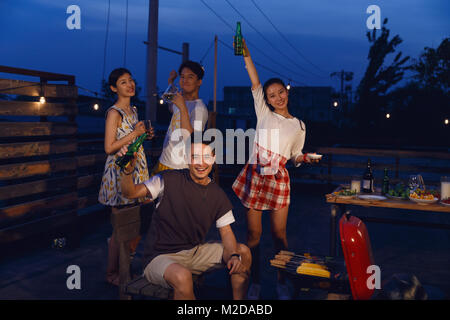 The young people have a picnic Stock Photo
