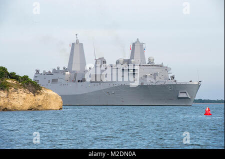 GUANTANAMO BAY, Cuba (Jan. 2, 2018) The to to be commissioned San Antonio-class amphibious transport dock ship USS Portland (LPD 27) transits Guantanamo Bay during a brief fuel stop. The ship is currently on its way to home port in San Diego, and is scheduled to be commissioned in its namesake city of Portland, Oregon in April. Naval Station Guantanamo Bay is the Navy’s strategic logistics installation for routine, contingency, humanitarian, counternarcotic and migrant operations in the Caribbean; providing high quality of life while preserving environmental, historic and cultural resources. ( Stock Photo