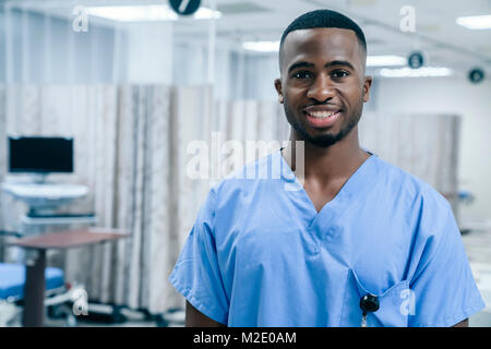 Portrait of smiling Black doctor in hospital Stock Photo