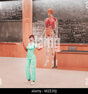 Teacher looking at organs of transparent hologram man Stock Photo