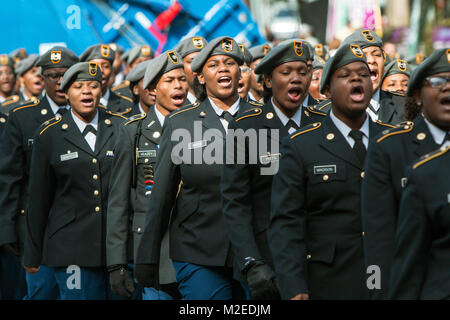 A group of high school junior ROTC cadets sound off while walking in the Georgia Veterans Day Parade, on November 11, 2017 in Atlanta, GA. Stock Photo