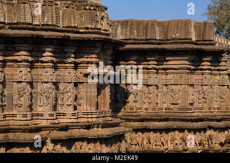 PLACE: Khidrapur, Dist. Kolhapur, Maharashtra State, India. The exterior has carvings of Gods, male - female artists in various poses. Stock Photo
