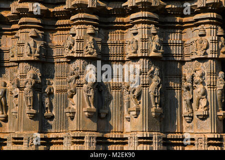 PLACE: Khidrapur, Dist. Kolhapur, Maharashtra State, India. The exterior has carvings of Gods, male - female artists in various poses. Stock Photo