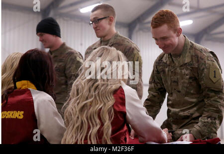 Washington Redskins Cheerleaders sign autographs for U.S. Army Soldiers for the 52nd Super Bowl Celebration during the Armed Forces Entertainment’s 58th Military Appreciation Tour at the 7th Army Training Command's Hohenfels Training Area, Hohenfels, Germany, Feb. 5, 2018. (U.S. Army Stock Photo