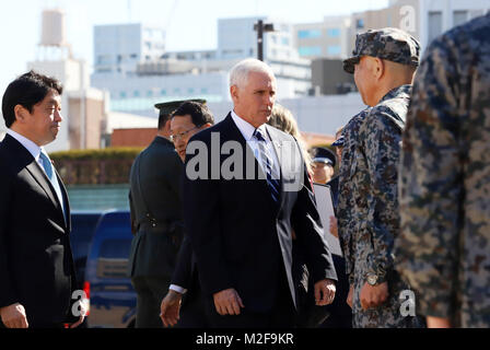 Tokyo, Japan. 7th Feb, 2018. U.S. Vice President Mike Pence (C) listens to an official of Japanese Self-Defense Force as he inspects Patriot Advanced Capability (PAC-3) missile interceptor launcher at the Defense Ministry in Tokyo on Wednesday, February 7, 2018. Pence is now here on a three-day visit to Tokyo. Credit: Yoshio Tsunoda/AFLO/Alamy Live News Stock Photo