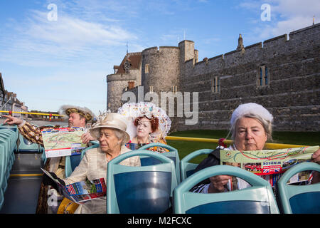 Windsor, UK. 7th February, 2018. Actors playing King Henry VIII, Queen Elizabeth I, Queen Victoria and Queen Elizabeth II launch The Original Tour Windsor. From 10th February, visitors will be able to enjoy an open-top hop-on hop-off bus tour of Windsor featuring Windsor Castle (including Changing of the Guard), Eton College, and the Windsor Farm Shop with the possibility of combining it with a 40-minute French Brothers cruise on the river Thames. Credit: Mark Kerrison/Alamy Live News