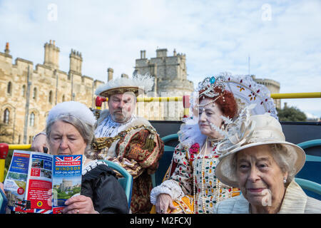 Windsor, UK. 7th February, 2018. Actors playing King Henry VIII, Queen Elizabeth I, Queen Victoria and Queen Elizabeth II launch The Original Tour Windsor. From 10th February, visitors will be able to enjoy an open-top hop-on hop-off bus tour of Windsor featuring Windsor Castle (including Changing of the Guard), Eton College, and the Windsor Farm Shop with the possibility of combining it with a 40-minute French Brothers cruise on the river Thames. Credit: Mark Kerrison/Alamy Live News
