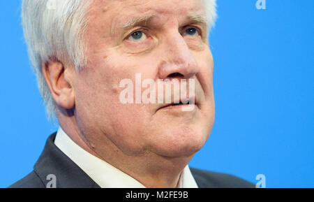 Berlin, Germnay. 07th Feb, 2018. Horst Seehofer, Premier of Bavaria and chairman of the Christian Social Union (CSU) delivers a statement at the end of the coalition negotiations of the CDU, CSU and the SPD during a press conference at the CDU's party headquarter, the Konrad-Adenauer-Haus, in Berlin, Germnay, 07 February 2018. Credit: Gregor Fischer/dpa/Alamy Live News