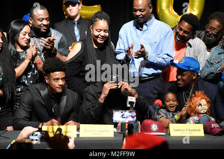 Plantation, Florida, USA. 18th Jan, 2018. fl-sp-ah-nsd-20180207-15 Family, friends and teammates celebrate as (middle) Tyson Campbell announces heÃ¢â‚¬â„¢s signing with University of Georgia on National Signing Day at American Heritage in Plantation Wednesday morning. TAIMY ALVAREZ/SUN-SENTINEL Credit: Sun-Sentinel/ZUMA Wire/Alamy Live News Stock Photo