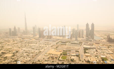 Aerial view of the business district of Dubai. Shooting in the summer haze of heat. August 2014. UAE. Stock Photo
