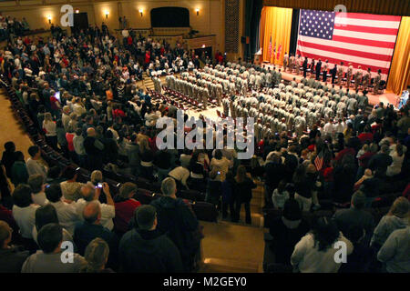 About 1,000 Family members, friends and employers crowd around the Dayton Masonic Center, Dayton, Ohio to honor the Soldiers of C Troop 2nd Squadron, 107th Cavalry Regiment. About 130 Soldiers from C Troop returned home on March 22, 2010 from a yearlong deployment in support of Operation Iraqi Freedom where they performed convoy security operations for nearly 15,000 logistic vehicles carrying more than $3 billion in military equipment, government property and life-sustaining commodities. (Ohio National Guard photo by Sgt. Sean Mathis) Over 1,000 Attend Ceremony by Ohio National Guard Stock Photo