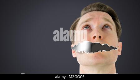 Man with torn paper on mouth Stock Photo