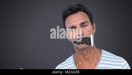 Man with torn paper on mouth Stock Photo