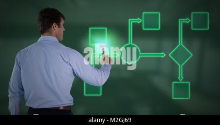 Man's Hand touching green wireframe Stock Photo