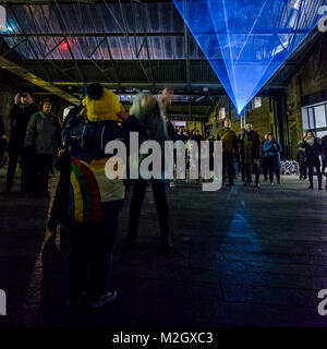 Crowds enjoy Aether by the Architecture Social Club with Max Cooper - an installation within the Kings Cross Area of Lumiere London 2018 on Friday January 19 2018 Stock Photo