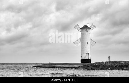 Black and white picture of the windmill lighthouse in Swinoujscie, Poland. Stock Photo