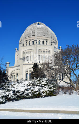 The North American Bahai House of Worship, located in Wilmette, Illinois, contrasted against blue skies the day after a winter snow storm. Stock Photo