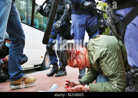 More than 50 people arrested and several police injuries when violently clashes broke out between police and food vendors. The clashes are dubbed the “Fishball Revolution” and took place at the Lunar New Year celebrations in Mong Kok, Honk Kong. Some protestors are badly injured during the fight. Stock Photo