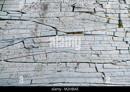 Grunge stone background. Close-up wall of layered grey mountain  Stock Photo
