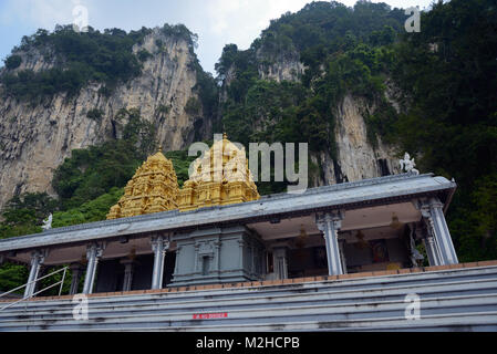 Kuala Lumpur, Malaysia - November 3, 2014: One of the Hindu temples in the territory of Batu Caves. Batu Caves - a complex of cave hills and Hindu shr Stock Photo