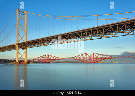 Forth Road Bridge and the Forth Rail Bridge from Port Edgar, South Queensferry, Edinburgh, Scotland Stock Photo